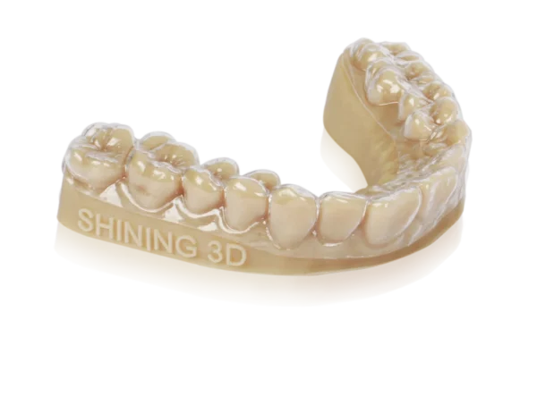 Close-up of a brown OD02 Resin Orthodontics model by Shining 3D, showcasing intricate details and smooth texture for dental applications