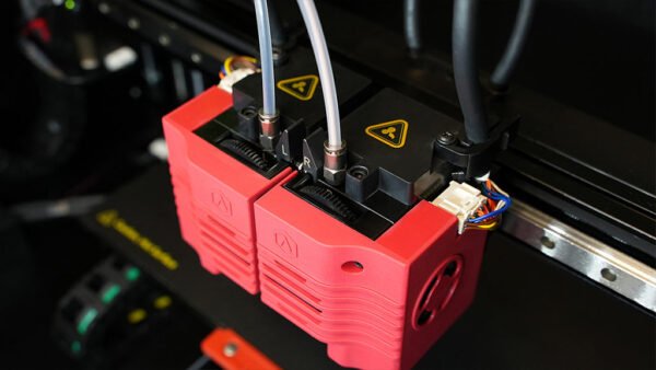 High-tech Raise3D E2CF 3D Printer fabricating detailed mechanical parts effortlessly